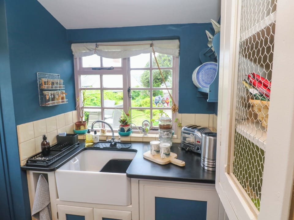 Fridge, microwave, cookware/dishes/utensils