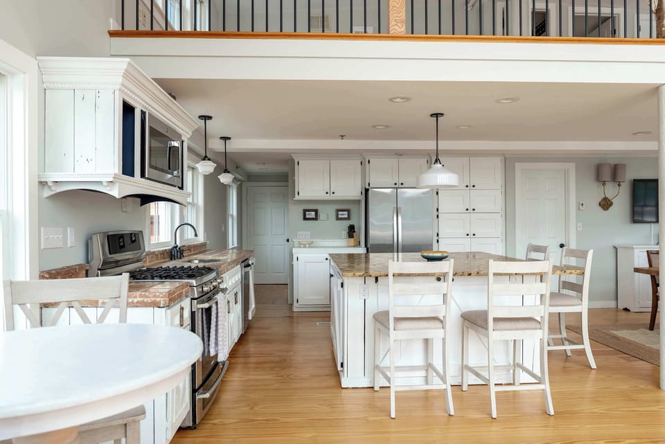 Kitchen with casual dining and elevated harbor overlooks