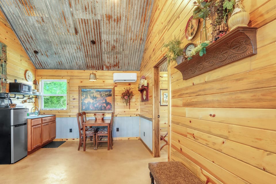 To the right of the table is the entrance to bedroom 1.