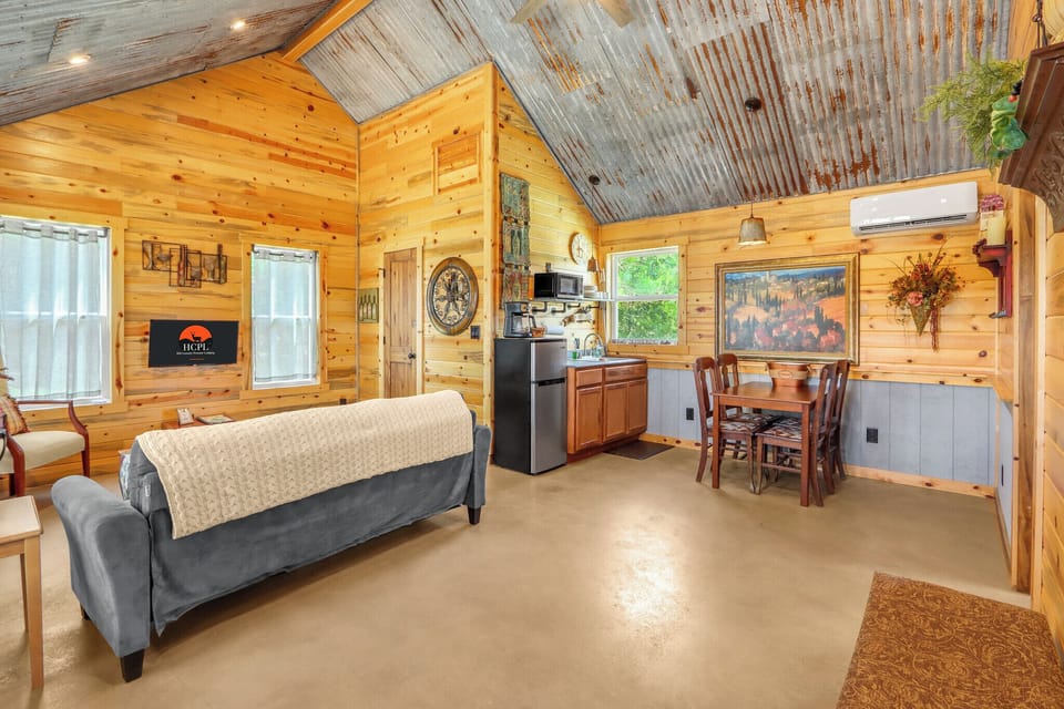 View as you enter the cabin.  The living room is on the left and the bathroom entrance can be seen beyond the couch.