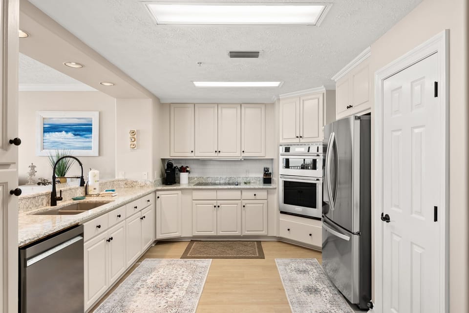 Modern kitchen with stainless steel appliances and ample cabinet space