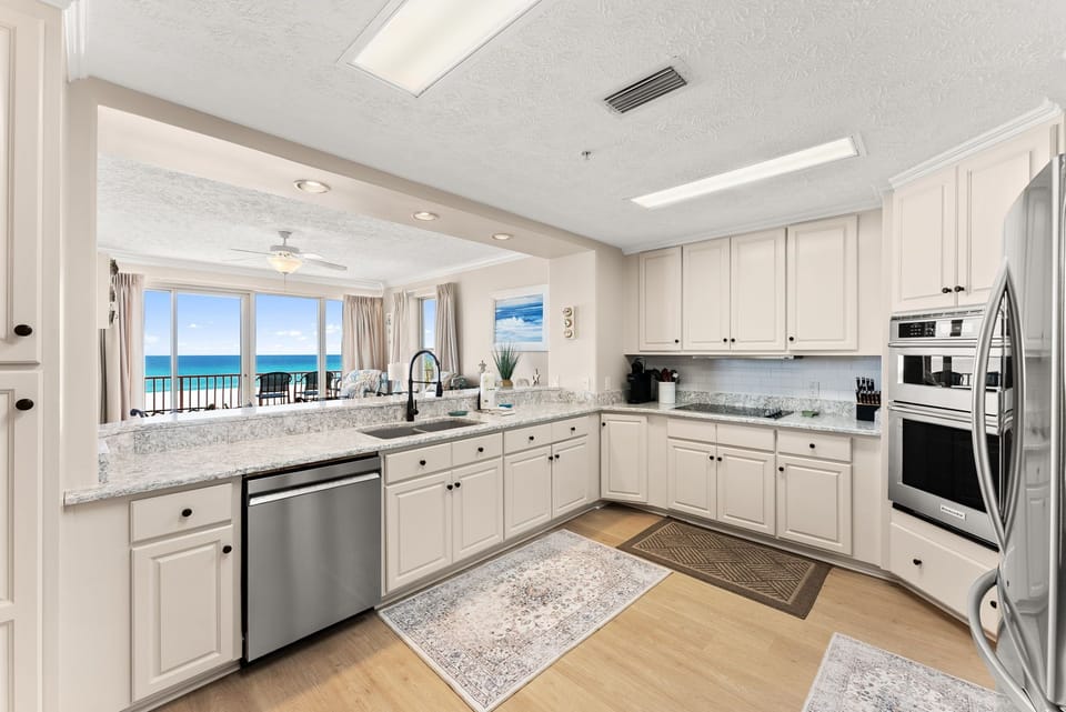 spacious kitchen with ocean views and modern appliances