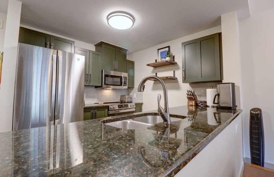 Condo, 2 Bedrooms | Private kitchen | Fridge, oven, coffee/tea maker, toaster