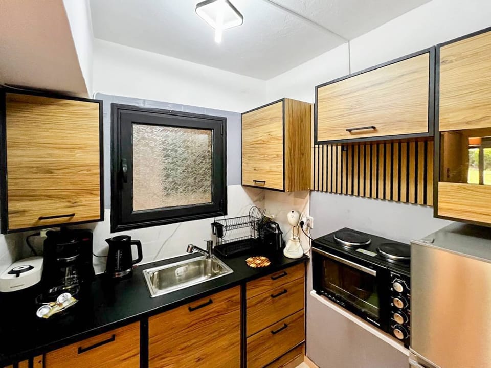 Fully equipped kitchenette that includes all essentials for cooking light meals or enjoying a morning espresso!