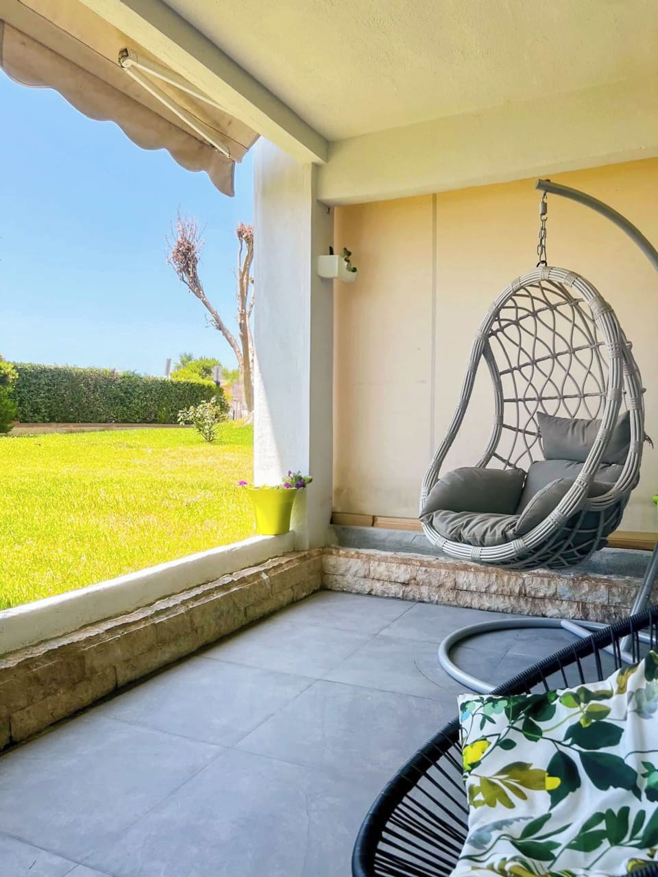 Comfortable outdoor lounge. Enjoy morning coffee or evening drinks with a view of the garden