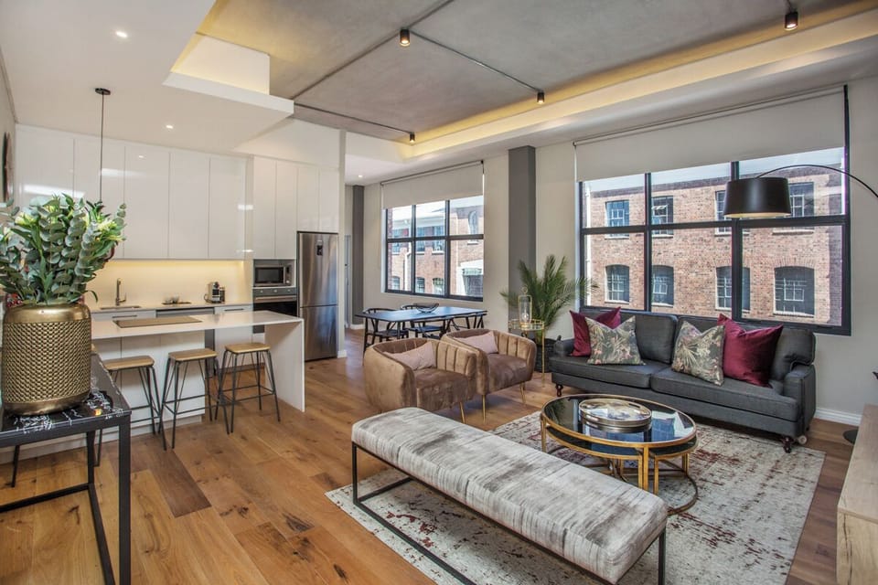 Executive Apartment, City View | Living area | TV