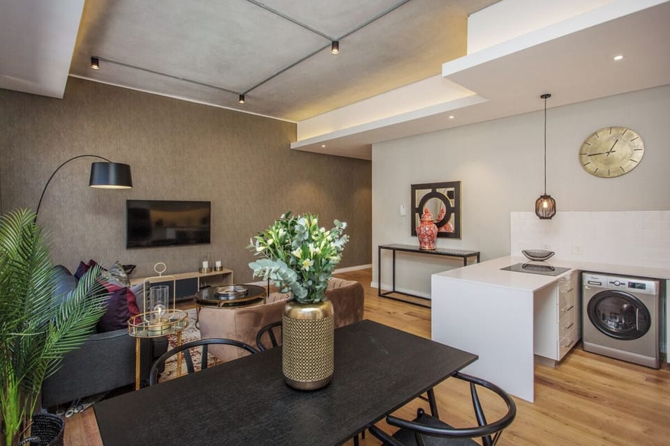 Executive Apartment, City View | Living area | TV