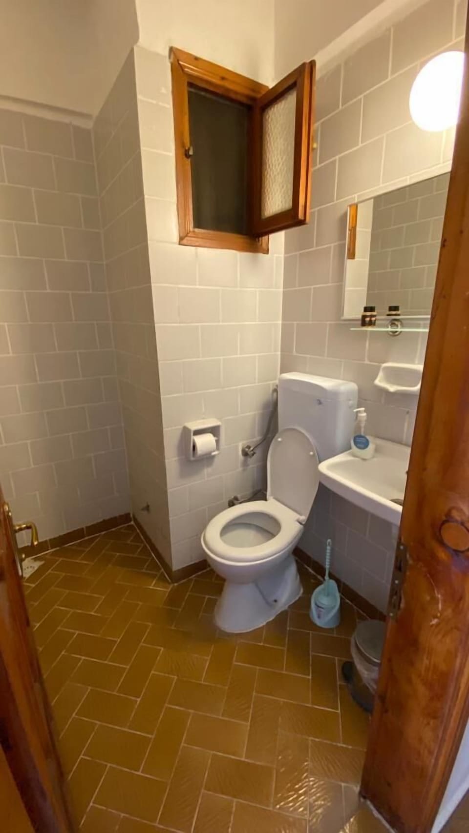 Shower, hair dryer, slippers, towels