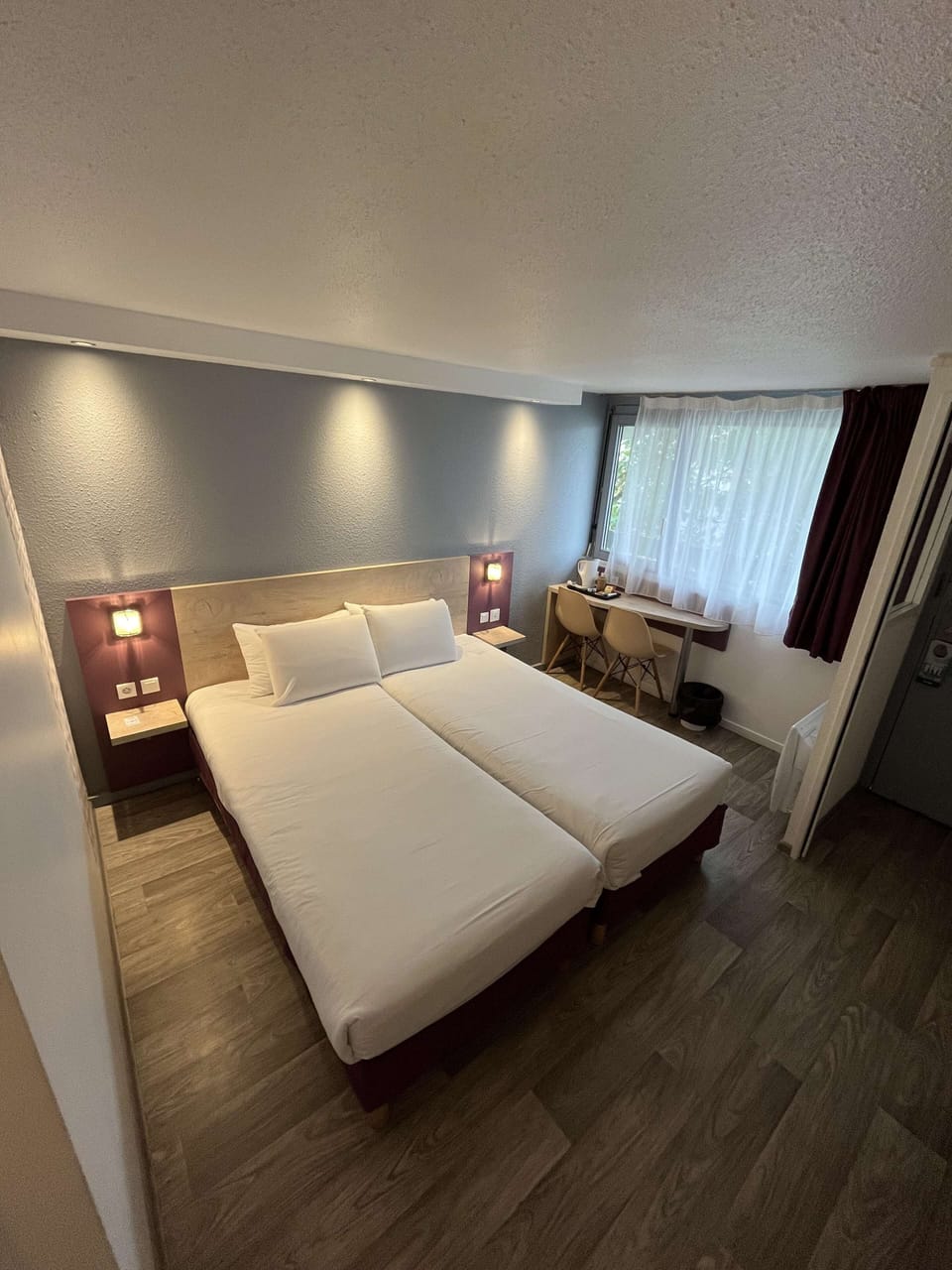 Desk, laptop workspace, blackout drapes, soundproofing