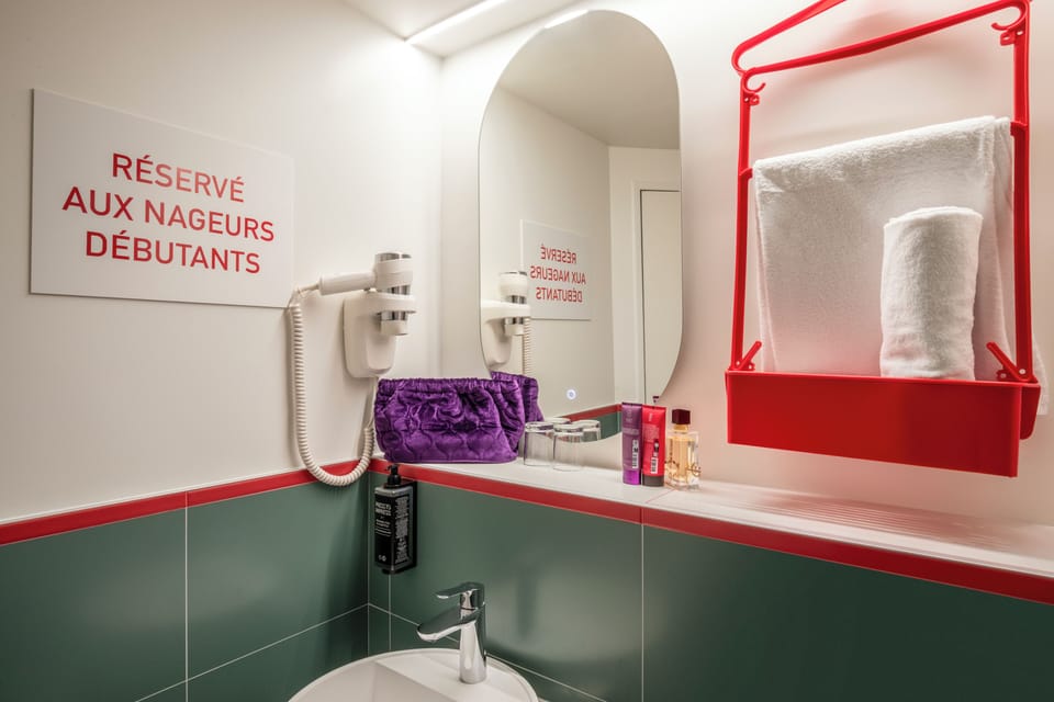 Shower, eco-friendly toiletries, hair dryer, towels