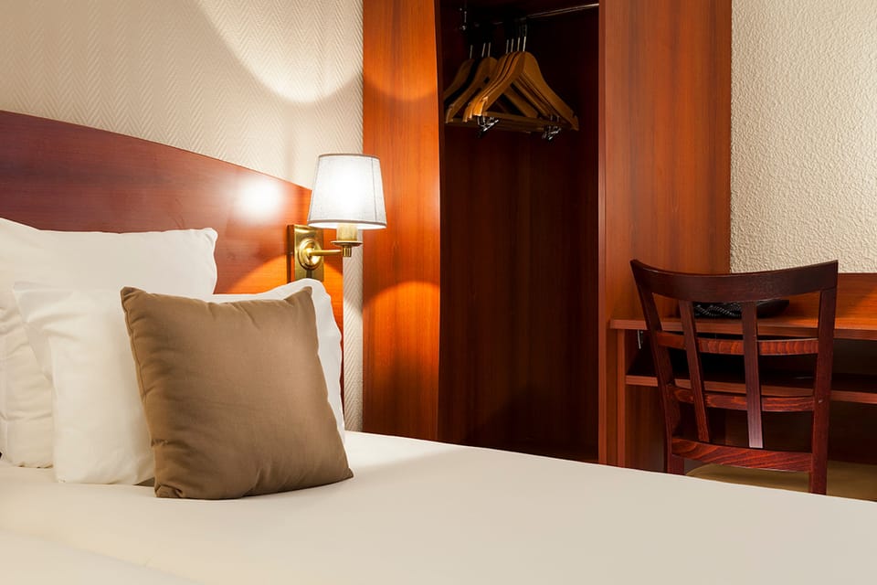 In-room safe, desk, WiFi (free), alarm clocks