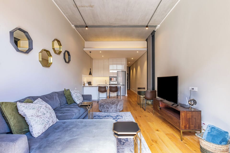 Luxury Apartment, Balcony, City View | Living area | TV