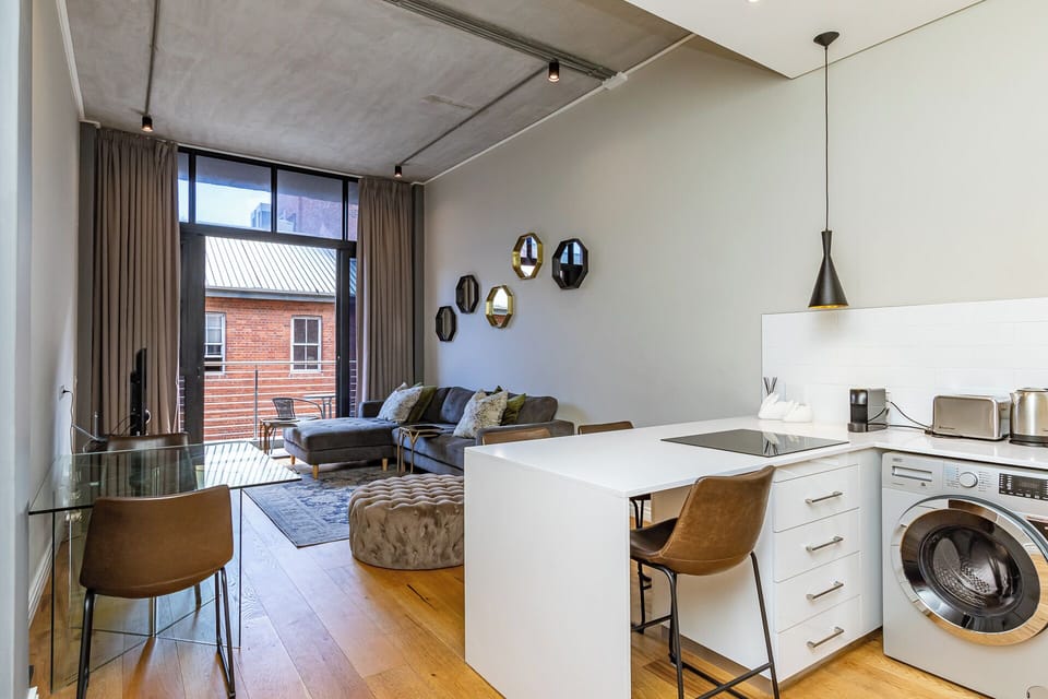 Luxury Apartment, Balcony, City View | Living area | TV
