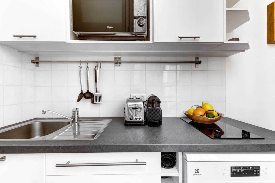 The kitchen is fully equipped to prepare a simple meal 