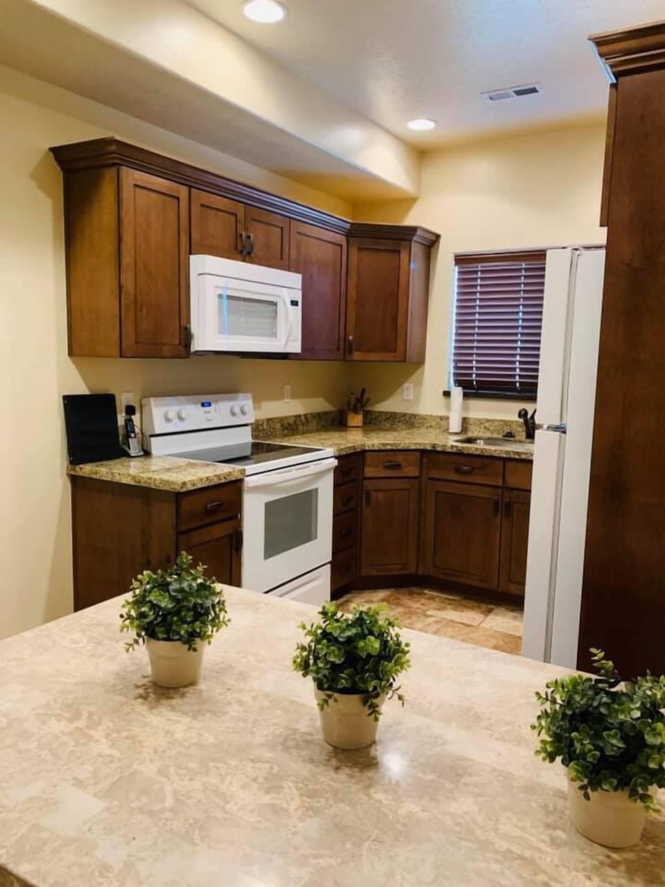 Executive Townhome, Multiple Bedrooms, Non Smoking, Pool Access | Private kitchen | Full-size fridge, microwave, coffee/tea maker, toaster