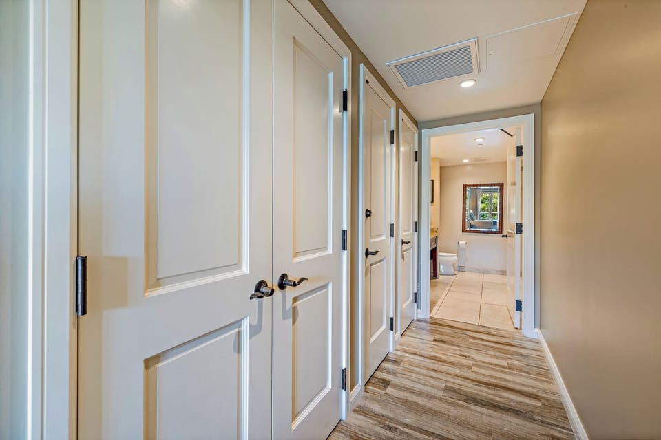 Welcoming hallway leads you into the airy, coastal-inspired interior of Honua Kai Konea 230/232.