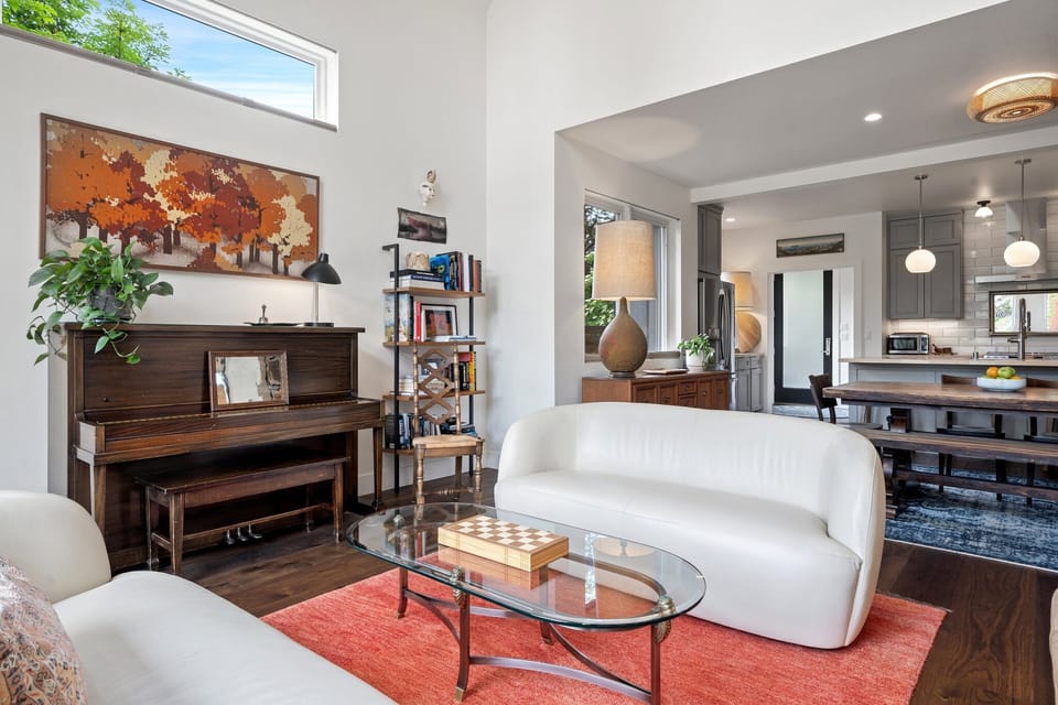 Creative touches and curated decor bring warmth and inspiration to this open living area.
