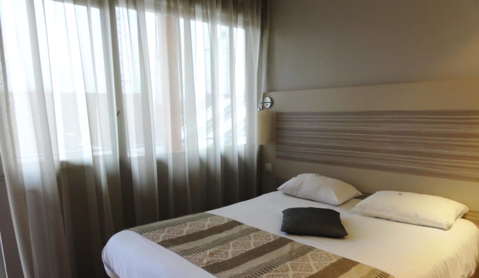 Premium bedding, individually furnished, desk, laptop workspace