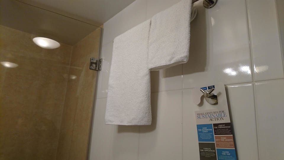 Shower, rainfall showerhead, eco-friendly toiletries, hair dryer