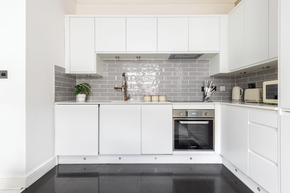 Apartment | Private kitchen | Full-size fridge, microwave, oven, stovetop