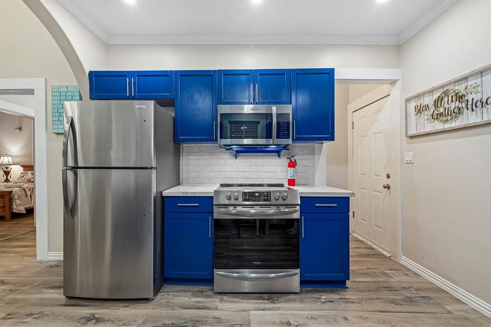 New full size appliances, back door leads to lush backyard paradise