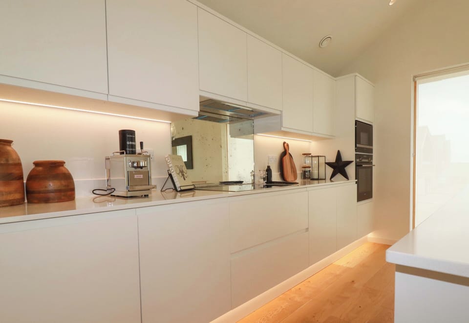Fridge, dishwasher, toaster, cookware/dishes/utensils