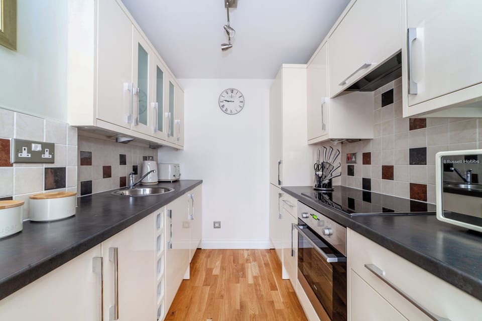 Apartment | Private kitchen | Full-size fridge, microwave, oven, stovetop