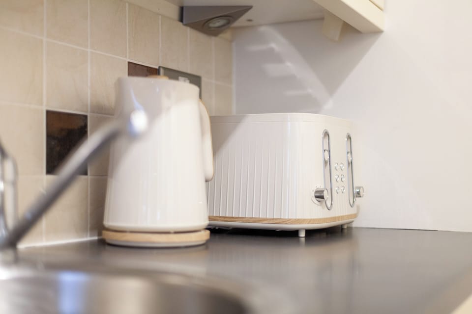 Apartment | Private kitchen | Full-size fridge, microwave, oven, stovetop