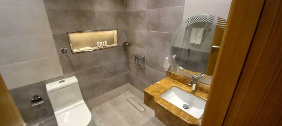 Shower, free toiletries, hair dryer, bathrobes