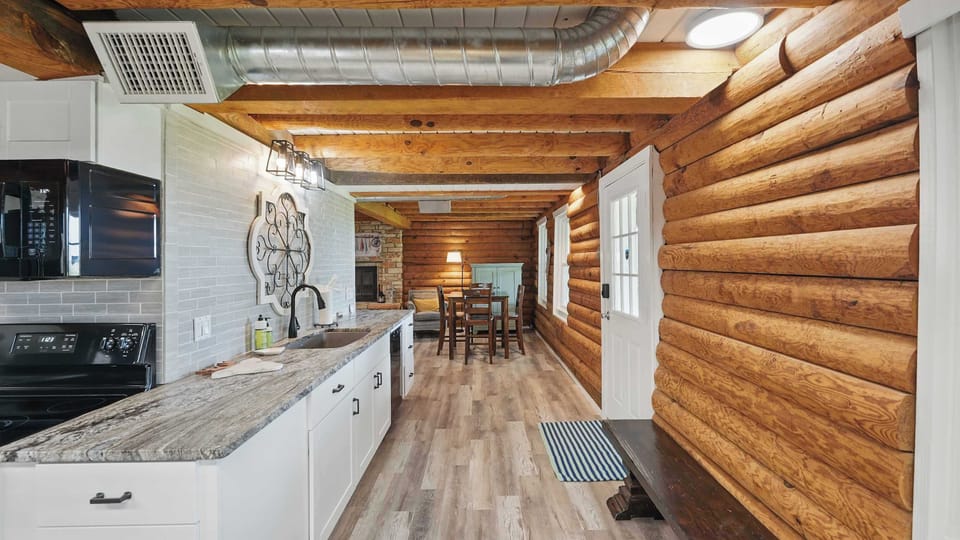 Step in from the patio to see the bright kitchen counter area — a welcoming entry into the heart of the home.