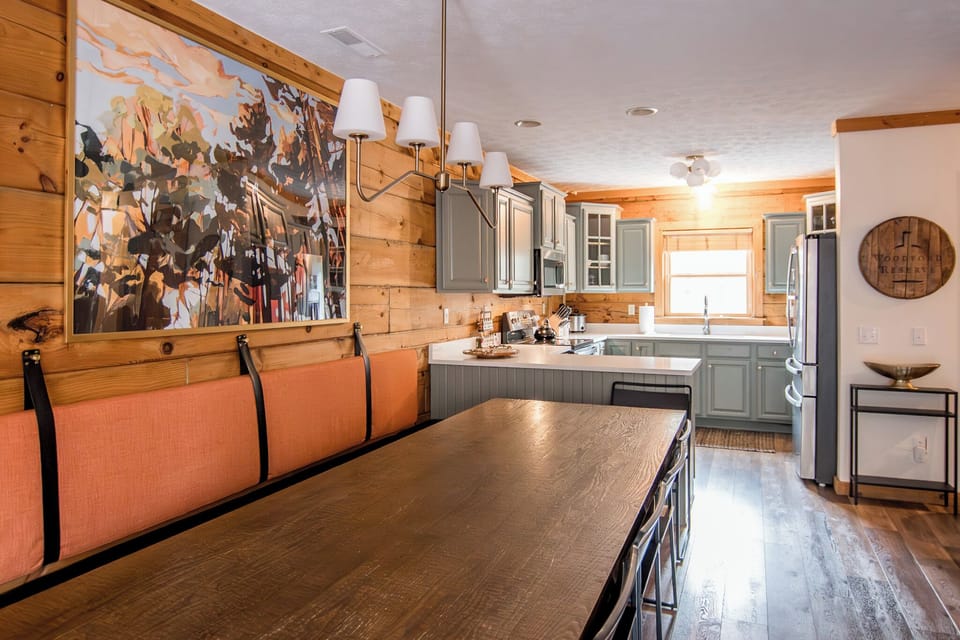 The kitchen opens into the large dining area.