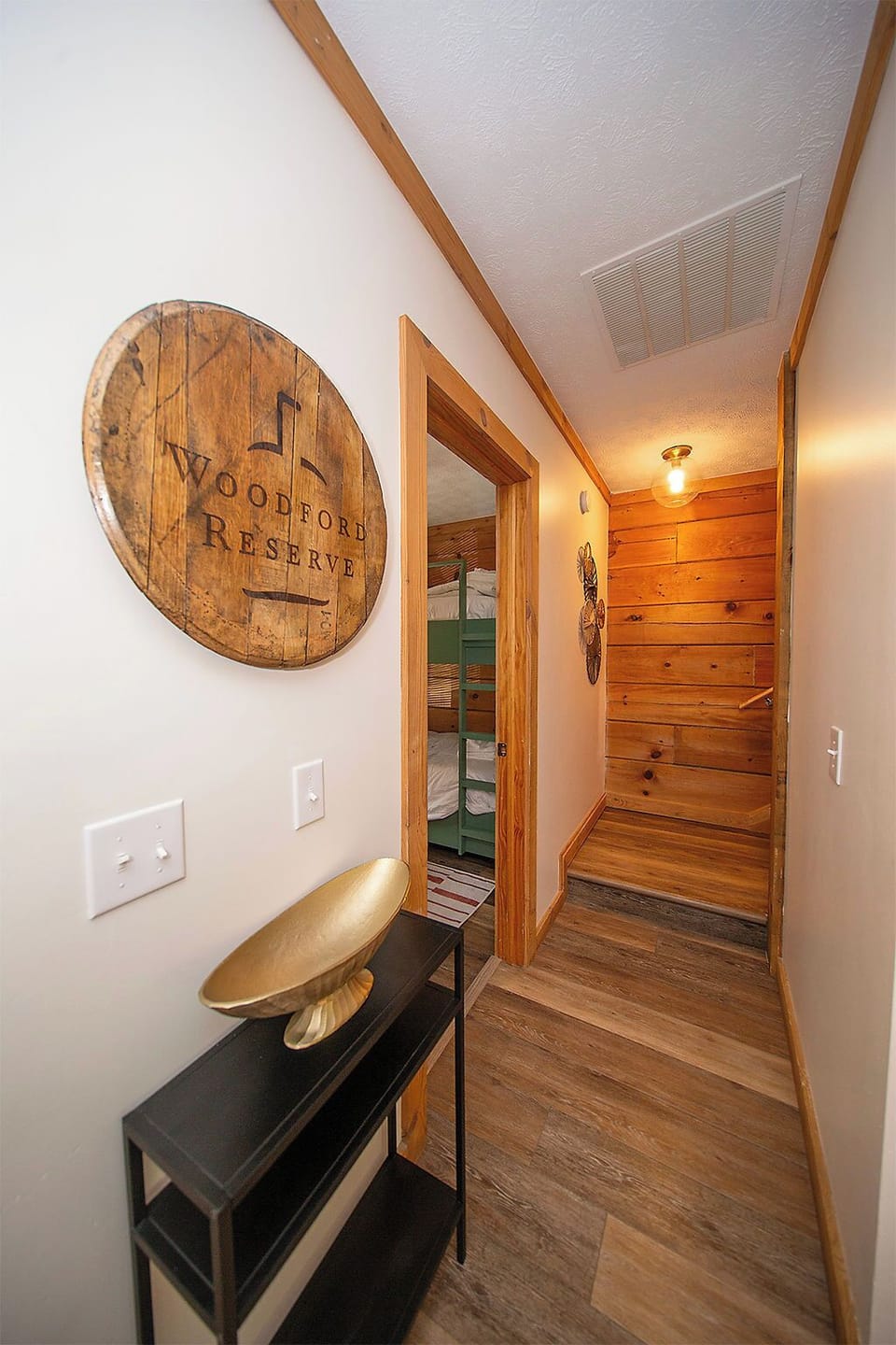 There is also a small bedroom on the main level, right off the kitchen.