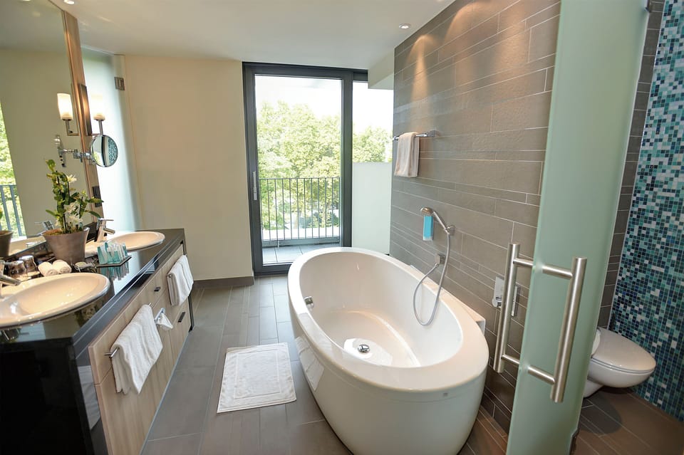 Penthouse Suite | Bathroom | Free toiletries, hair dryer, bathrobes, slippers
