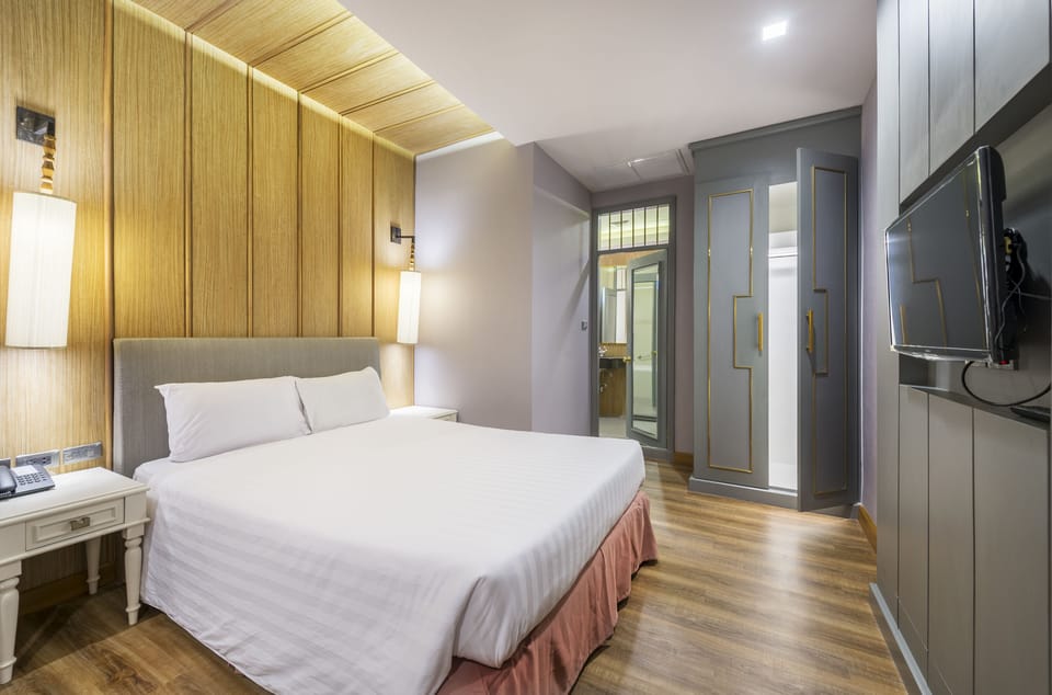 Suite, 2 Bedrooms | Desk, soundproofing, free WiFi