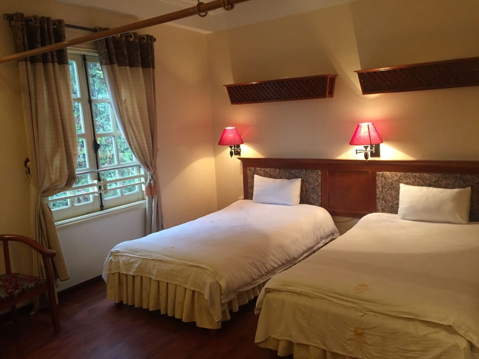 Standard Double or Twin Room | Minibar, in-room safe, desk, laptop workspace