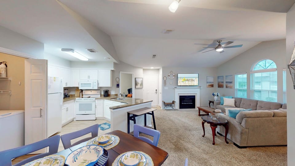 The common living areas of the condo are seamlessly integrated to allow a smooth flow of activity, ensuring everyone from the cook to the couch potato can enjoy the entire experience together.