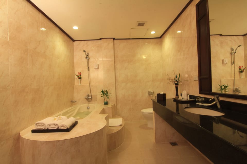 Separate tub and shower, deep soaking tub, designer toiletries