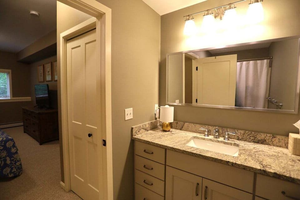 Downstairs private full bathroom at Forest Knoll Condo in Waterville Valley, NH