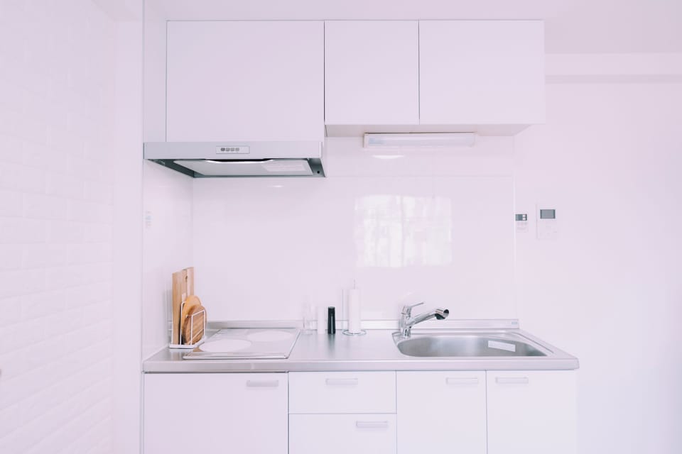 Apartment, 1 Queen Bed with Sofa bed, Non Smoking | Private kitchen | Electric kettle, dining tables