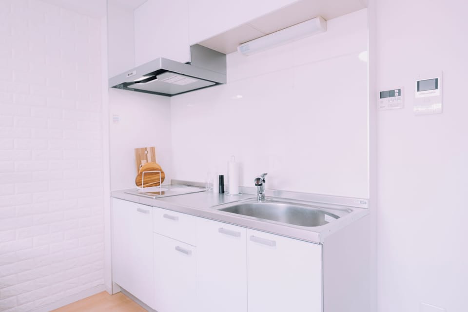 Apartment, 1 Queen Bed with Sofa bed, Non Smoking | Private kitchen | Electric kettle, dining tables