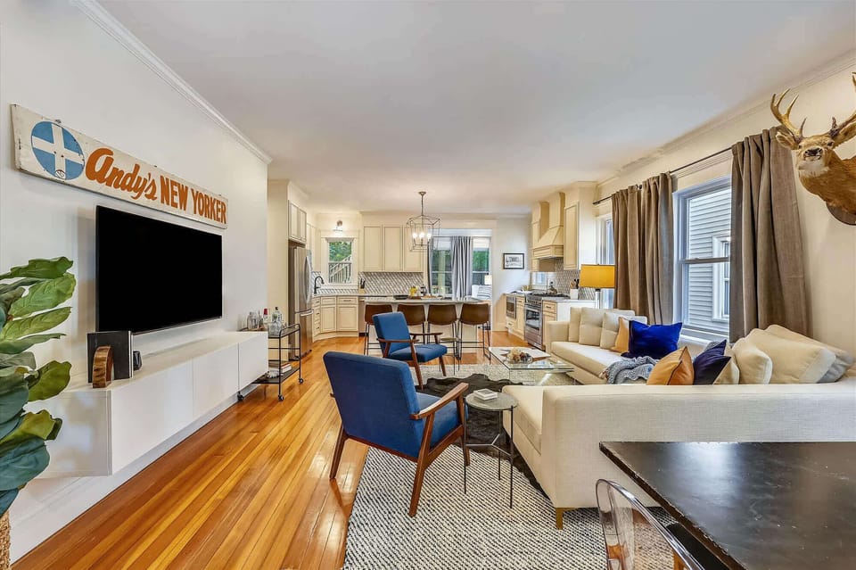 Unit 3 | Open Concept Living Room | XL Flat Screen TV | Natural Light | Third Floor
