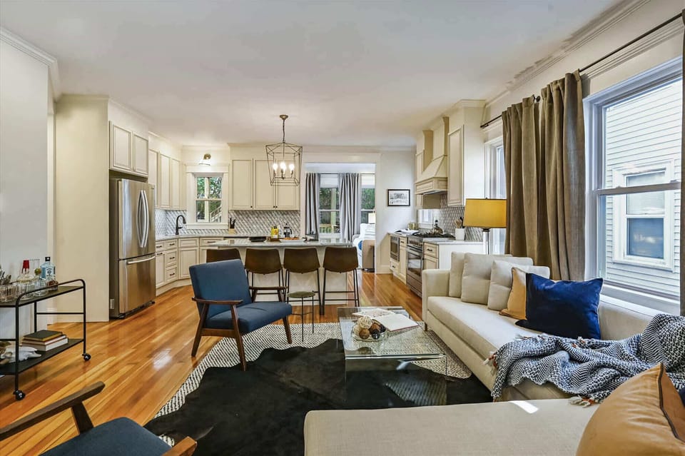 Unit 3 | Open Concept Living Room | XL Flat Screen TV | Natural Light | Third Floor
