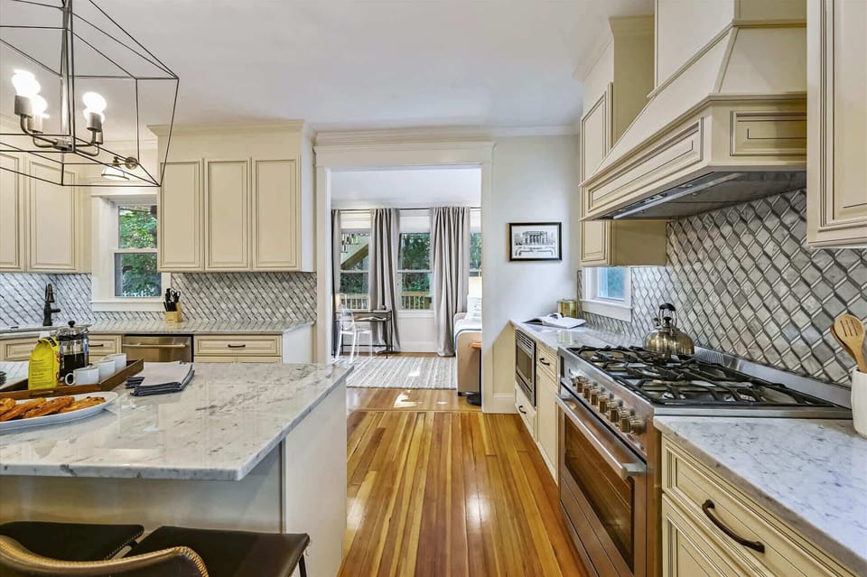 Unit 3 | Open Concept Chef's Kitchen | Fully Stocked | Open to Dining | Third Floor
