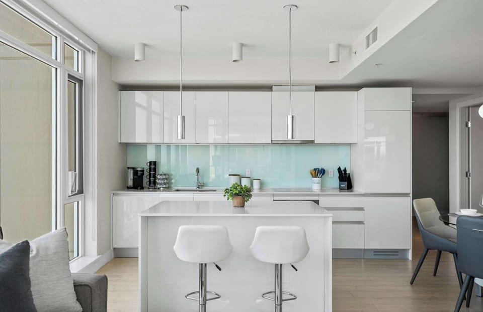 Well-equipped kitchen with coffee station and oven