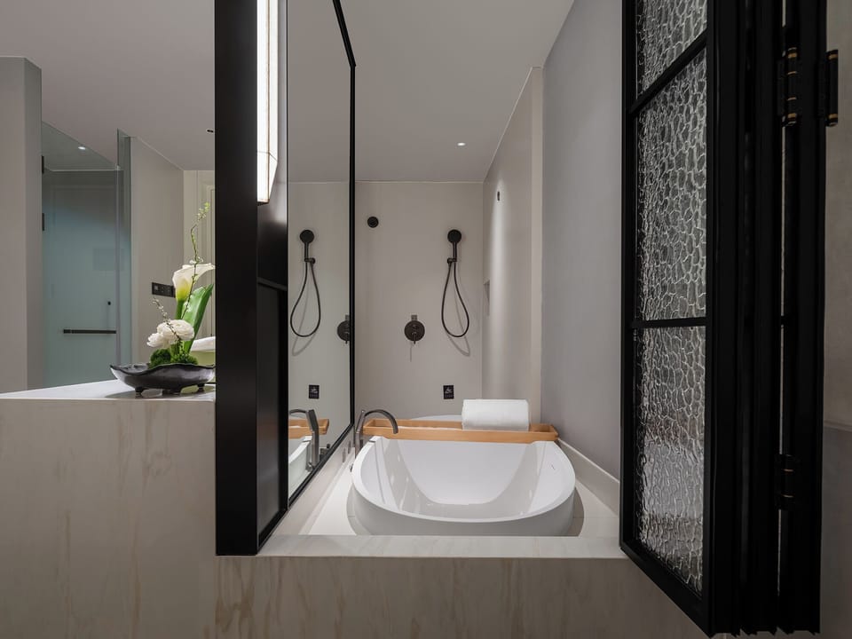 Deluxe Twin Room, City View | Bathroom | Rainfall showerhead, free toiletries, hair dryer, bathrobes