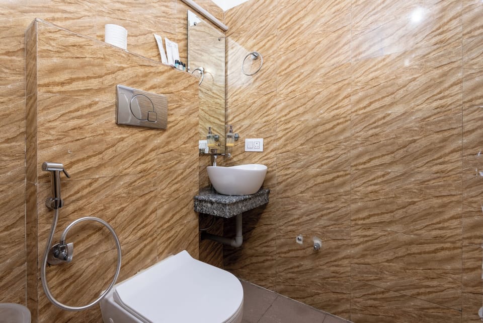 Shower, free toiletries, hair dryer, slippers