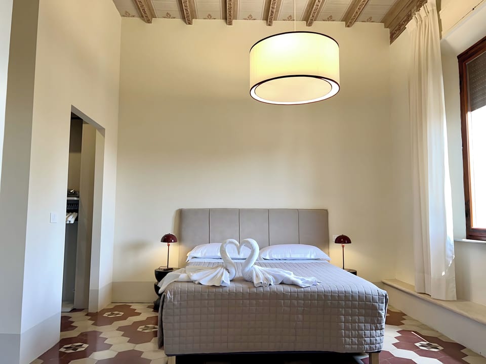 Family Suite, City View | In-room safe, desk, laptop workspace, blackout drapes