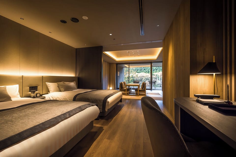 Deluxe Quadruple Room, Balcony, Mountain View | Free minibar, in-room safe, iron/ironing board, free WiFi