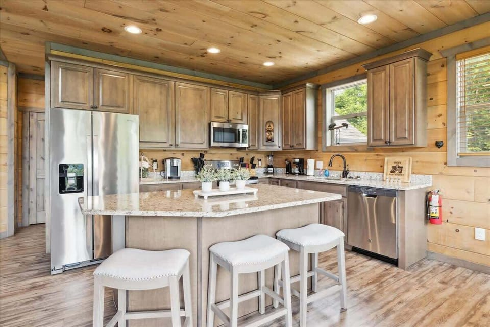 Gourmet Kitchen: Whip up culinary delights in this stunning, modern kitchen with scenic views!