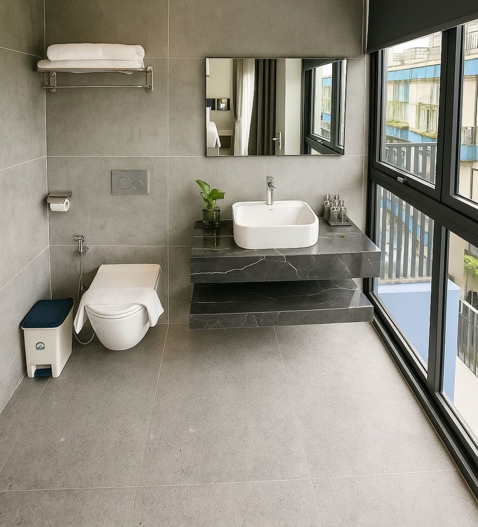 Deluxe Double Room, Balcony, Sea View | Bathroom | Designer toiletries, hair dryer, bathrobes, slippers